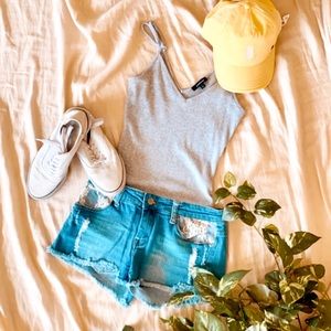 Forever 21 low rise Jean shorts with lace pockets